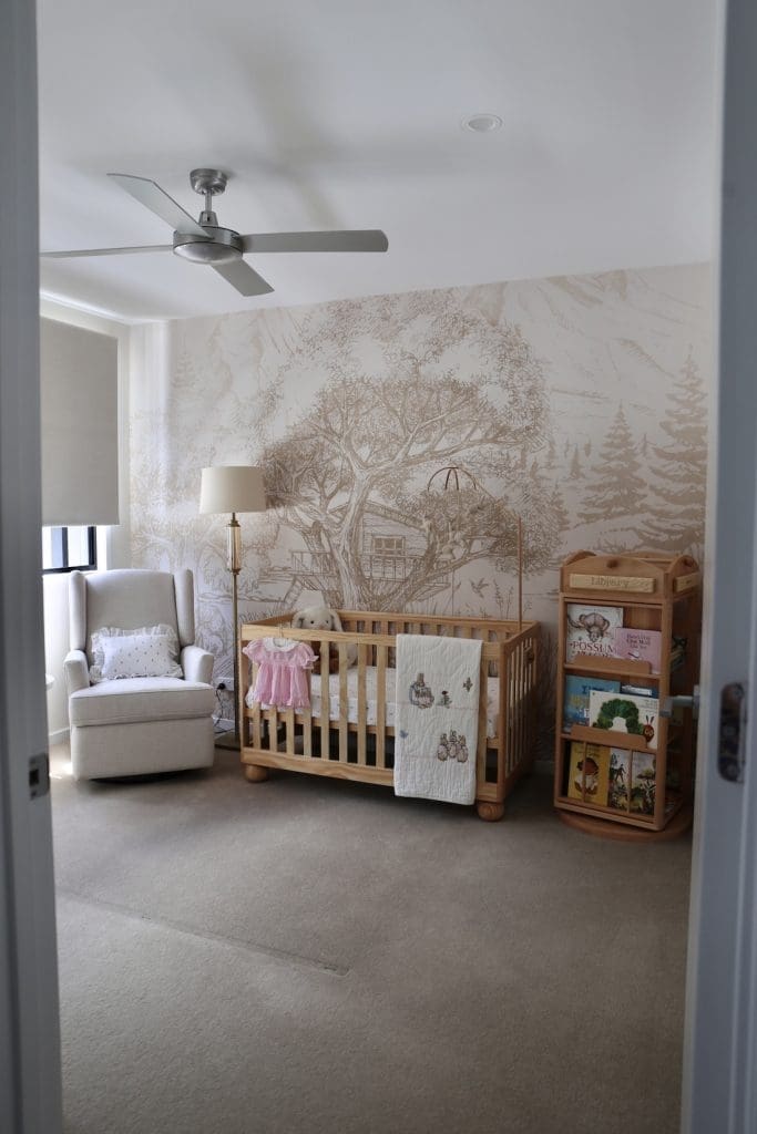 Woodland wallpaper in gender neutral nursery