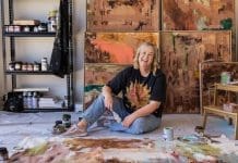 Bec Talbot on floor of studio