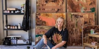 Bec Talbot on floor of studio