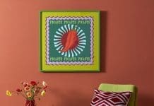 Trend forecast: The colours of 2026 are sun-soaked and bold Burnt clay living room wall