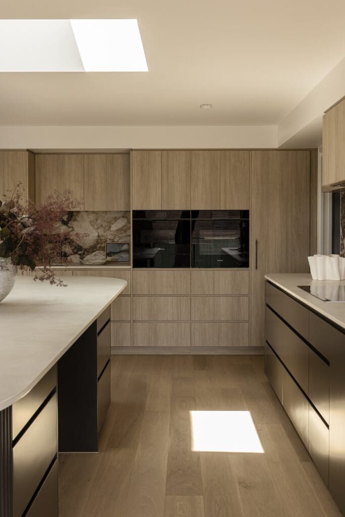 Kitchen with built in wall oven at Deakin Home