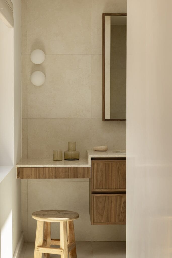 Makeup desk built into vanity in bathroom of Deakin Home